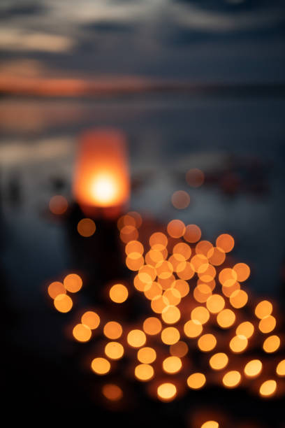 istock Blurry golden bokeh light warm tone background concept 1446271409