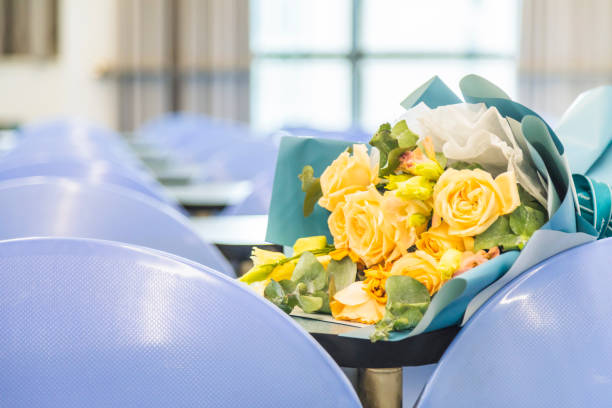 istock A bunch of flowers on a classroom desk 1446272374