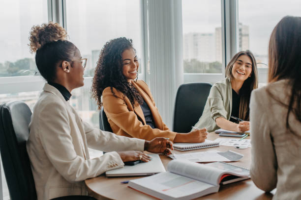 istock casual conversation between women during business meeting 1446273616