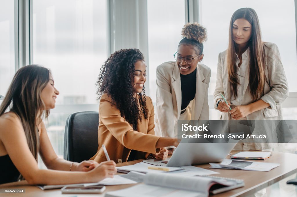 women engaged in solving problems Women Stock Photo