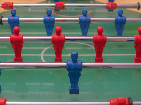 Red and blu foosball players