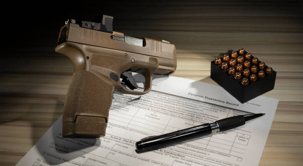 istock Form to purchase a gun with pistol and ammo 1446277621