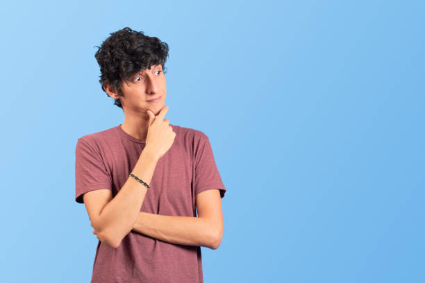 istock Young man interested and impressed by copyspace on flat lay. 1446279095