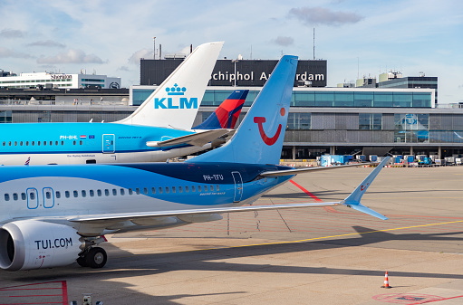 Brussels, Belgium - December 30, 2021: airplanes of the companies Aer Lingus and Air Canada in the boarding area.