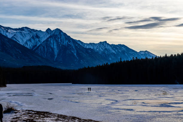 istock Skaters on Johnson Lake. Banff National Park, Alberta, Canada 1446287336