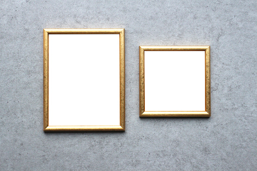 A set of two thin gold modern style picture photo frames with room for your image.