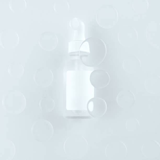 istock a bottle with a pipette for cosmetics on a background with drops 1446298169
