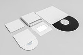 Music album mockup set. set box contents booklet cd, cd cover. Set of white mockup on gray background. Music card. 3D Render music album set.