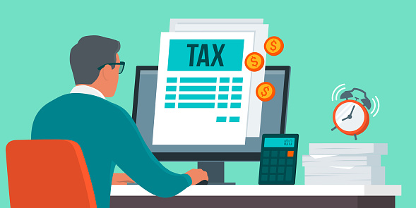 Businessman submitting the income tax return online, tax payment concept