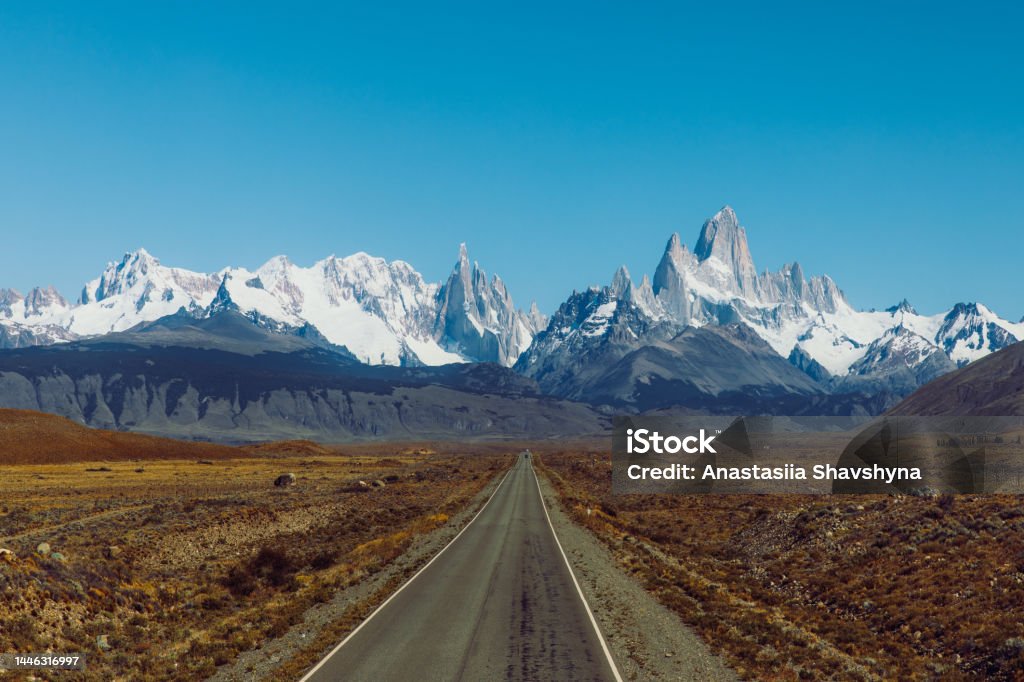 High-angle view of the scenic road with mountains view in Patagonia region of Argentina Aerial view of the highway to the dramatic mountain range with Fitz Roy mountain in the middle  - a road to El Chalten, Argentina Argentina Stock Photo