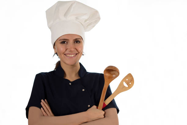 istock chef woman preparing food at restaurant kitchen 1446322132