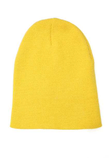 istock Yellow cotton beanie cap isolated on white background 1446328454