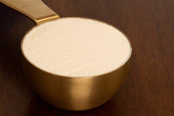istock Whey Protein Powder in a Measuring Cup 1446329881