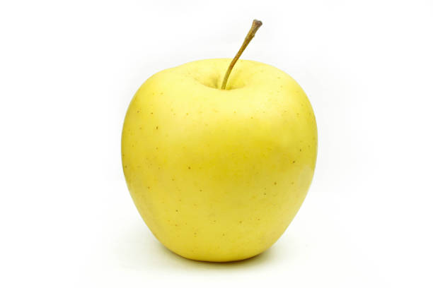 istock Single yellow apple isolated on white background. Golden delicious fruit 1446331742
