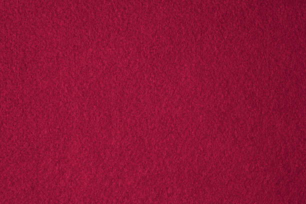istock Abstract felt textile fabric texture background. Viva magenta color background 1446332535