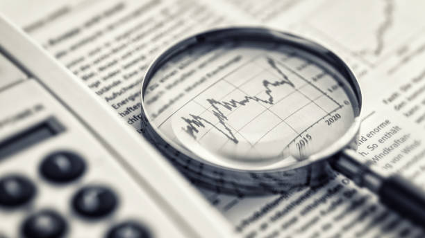 istock Examining the financial and stock market data 1446332915