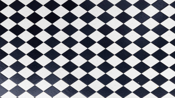 istock Tile Checkered texture background. Black And White Checkered Floor Tiles. 1446341613