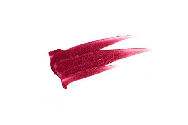 istock Abstract swatch of shimmer lipgloss smear,colored in red. 1446345641