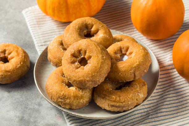 istock Homemade Pumpkin Spice Donuts 1446345679