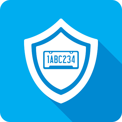 Vector illustration of a shield with license plate icon against a blue background in flat style.