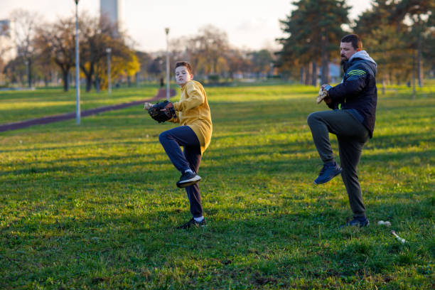 istock A 12-Year-Old Boy Learns The Rules Of Pitching From His Father 1446347518