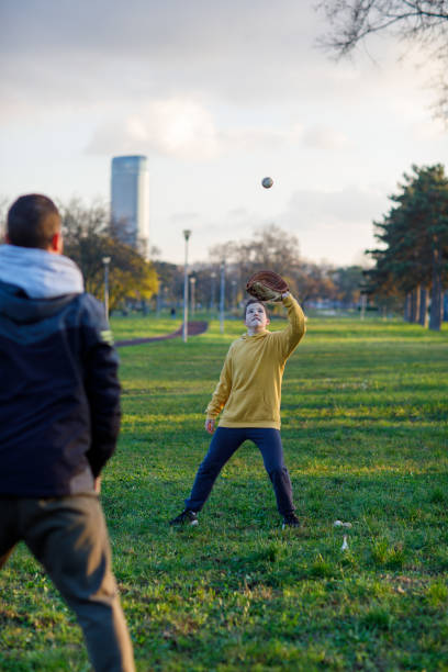 istock Father Plays Baseball Together With His Son 1446347654
