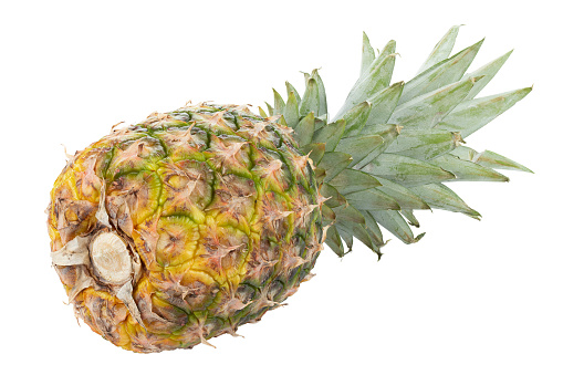Fresh whole pineapple isolated on white background. File contains clipping path.