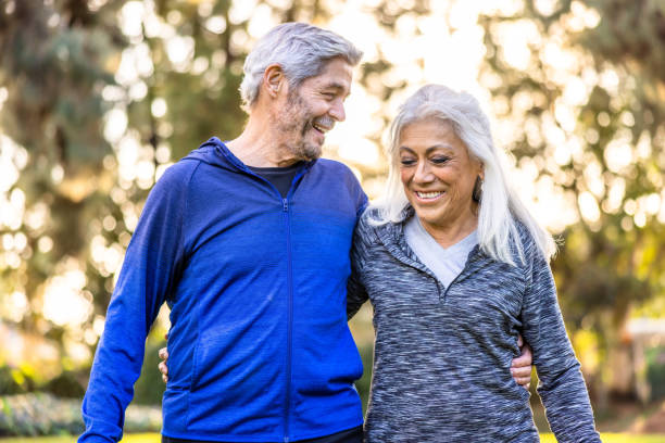 Senior couple walking together outside