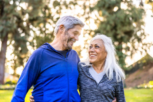 istock Senior couple walking together outside 1446349846