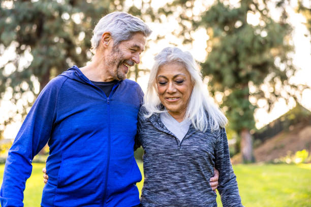 istock Senior couple walking together outside 1446349848