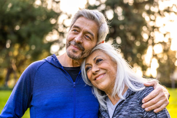 istock Senior couple walking together outside 1446349863