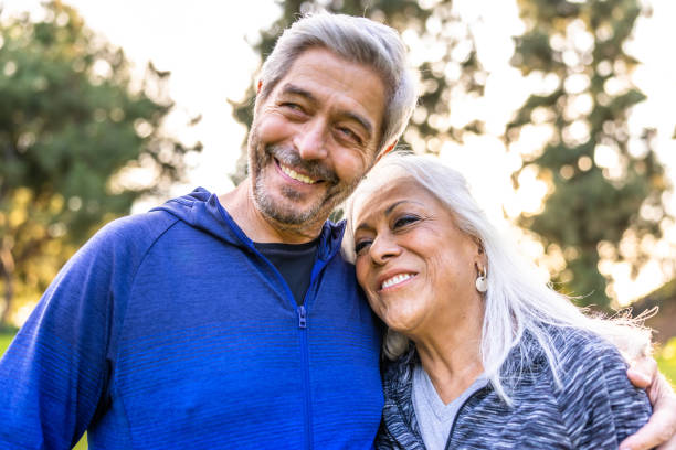 istock Senior couple walking together outside 1446349878