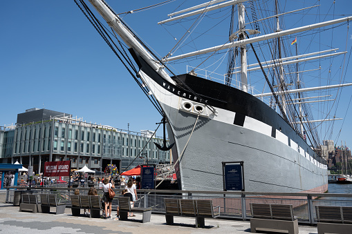 New York, NY, USA - June 4, 2022: The Wavertree, an 1885 cargo ship moored at Pier 16 that is part of the South Street Seaport Museum.