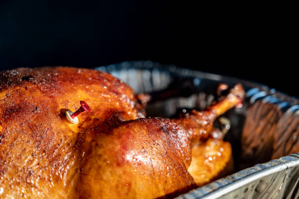 istock Pop-up thermometer timer in a smoked turkey 1446358309