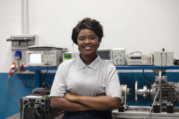 istock Portrait of happy african american female  student at technical school 1446358607