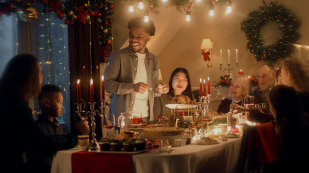 istock Multi cultural family celebrating Christmas 1446359482
