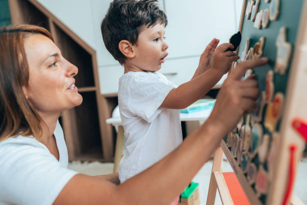 istock Mother playing with toddler 1446359547