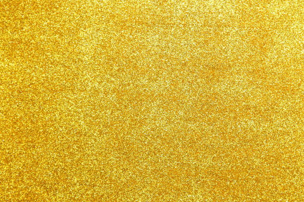 istock Beautiful texture of yellow sparkles. glitter background. shiny texture 1446361869
