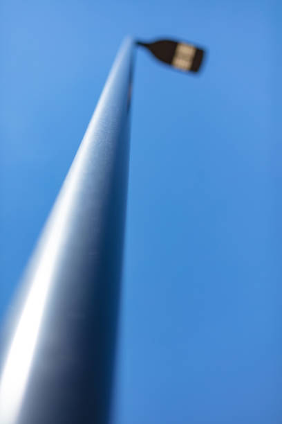 istock Light Pole in Focus - Green Source LED Parking Lot Light Photo Series 1446364910