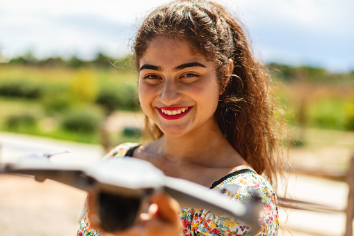 Western USA Generation Z Young Adult Hispanic Mexican American Teen Holding Drone Outdoors Summer Portraits Photo Series