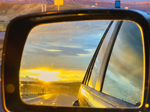 Western USA Interstate 70 Sunset in Rear View Mirror in Traffic Photo Series