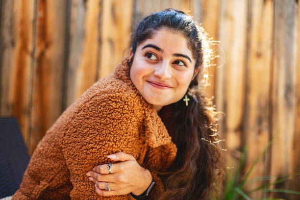 Autumn Patio Portraits Hispanic Mexican American Outdoors Photo Series Patio in Western USA Generation Z Young Adult Hispanic Mexican American Female Outdoors Autumn Portraits Photo Series beautiful young mexican american woman stock pictures, royalty-free photos & images