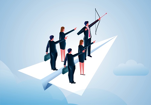 Start a new project or a new program, a new opportunity or a new challenge, the business team stands on a flying paper airplane and shoots at the target with a bow and arrow