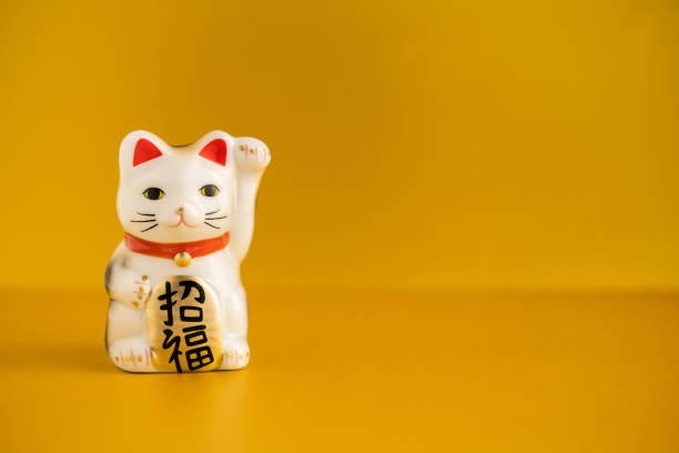 istock Lucky Cat, Japanese beckoning cat. 1446372613