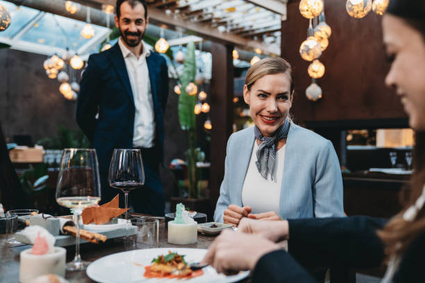 istock Elegant people are dining together in a luxury restaurant 1446375034