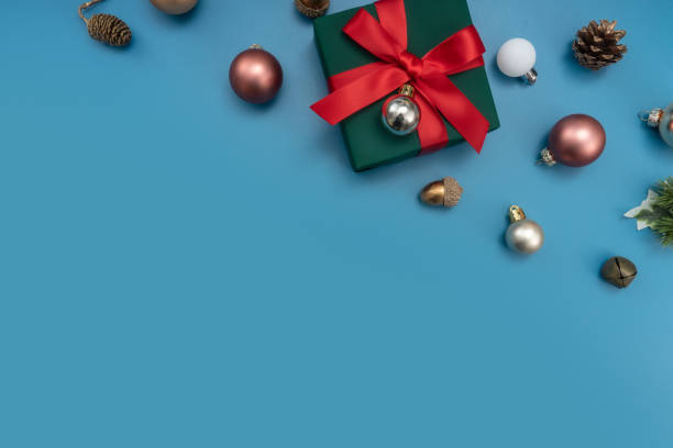 istock Christmas composition. festive decor on blue background. Copy space, flat lay, top view. 1446376170