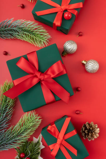 istock Christmas composition. festive decor on red background. Copy space, flat lay, top view. 1446376393
