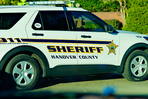 Ashland, Virginia, USA - November 20, 2022: A Hanover County Sheriff’s vehicle supports traffic flow on a sunny afternoon.