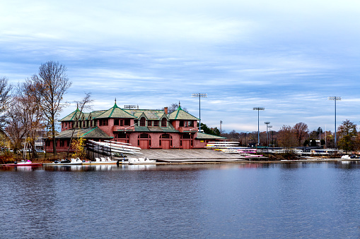 Boston, Massachusetts, USA - November 27, 2022: Newell Boathouse, named for a popular Harvard athlete killed just a few years after graduation, is the primary boathouse used by Harvard University's varsity men's rowing teams. Built in 1900 on the south side of the Charles River. it was Harvard's first permanent boathouse.