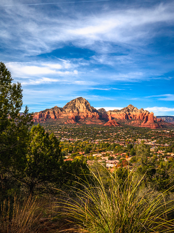 West Sedona Skyline and dramatic cloudscape with vistas of Sugarloaf Mountain Summit and Coffee Pot Rock, view from the Airport Mesa, Arizona, USA